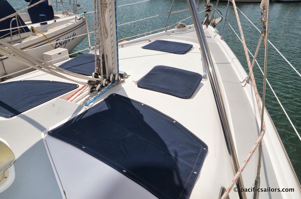 Sunbrella covers for all hatches as well as mesh covers for large deck windows.