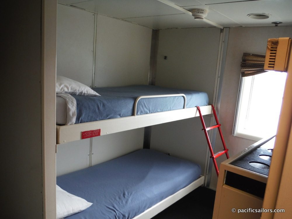 Our room aboard the M/V Matanuska has bunk beds, a private bathroom with shower and even a window.